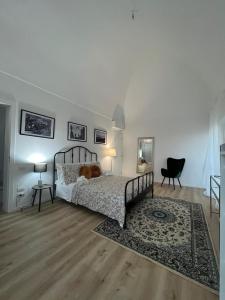 Postel nebo postele na pokoji v ubytování Palazzo Zagarella HOWME + 35 fotografií