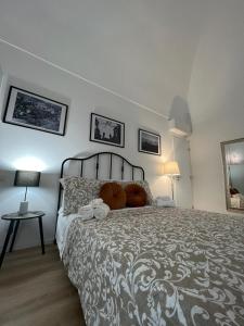 Postel nebo postele na pokoji v ubytování Palazzo Zagarella HOWME