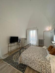 Postel nebo postele na pokoji v ubytování Palazzo Zagarella HOWME