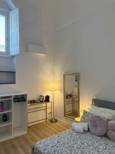 Postel nebo postele na pokoji v ubytování Palazzo Zagarella HOWME