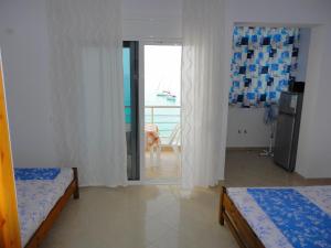 Postel nebo postele na pokoji v ubytování Spiro Guest House
