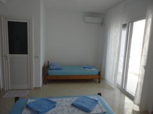 Postel nebo postele na pokoji v ubytování Spiro Guest House