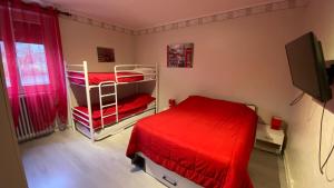 Postel nebo postele na pokoji v ubytování Hôtel Le Bambi