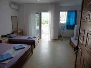 Postel nebo postele na pokoji v ubytování Spiro Guest House