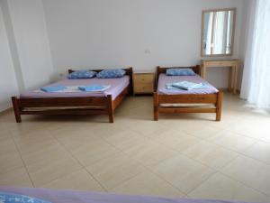 Postel nebo postele na pokoji v ubytování Spiro Guest House