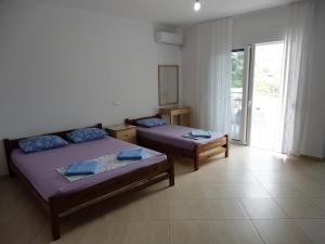 Postel nebo postele na pokoji v ubytování Spiro Guest House
