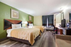 Postel nebo postele na pokoji v ubytování Quality Inn Baytown - Houston East