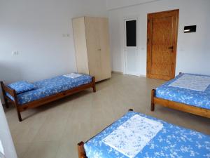 Postel nebo postele na pokoji v ubytování Spiro Guest House