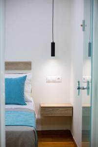 Posteľ alebo postele v izbe v ubytovaní Sun Moon Apartments