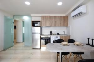 Kuchyňa alebo kuchynka v ubytovaní Sun Moon Apartments