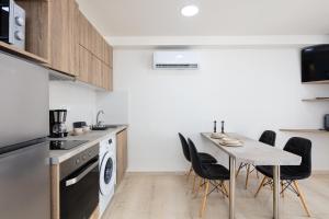 Kuchyňa alebo kuchynka v ubytovaní Sun Moon Apartments