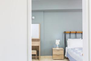 Posteľ alebo postele v izbe v ubytovaní Sun Moon Apartments