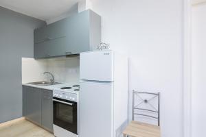 Kuchyňa alebo kuchynka v ubytovaní Sun Moon Apartments