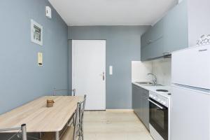Kuchyňa alebo kuchynka v ubytovaní Sun Moon Apartments