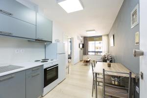 Kuchyňa alebo kuchynka v ubytovaní Sun Moon Apartments