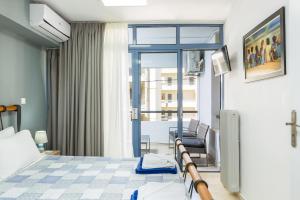 Posteľ alebo postele v izbe v ubytovaní Sun Moon Apartments