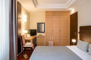 Кровать или кровати в номере Grand Hotel Spiaggia