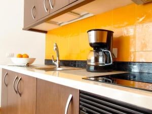 Kuchyň nebo kuchyňský kout v ubytování Sweet Friendly Holiday Home