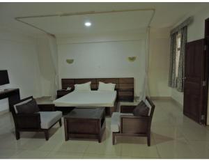 Postel nebo postele na pokoji v ubytování Sky Hotel Nairobi