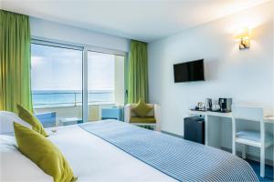 Cama ou camas em um quarto em Aqua Natura Madeira