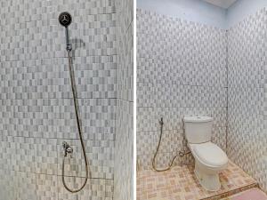 Et badeværelse på OYO 91418 Kantil Homestay Syariah