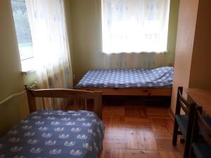Postel nebo postele na pokoji v ubytování Jõesuu Home Accommodation