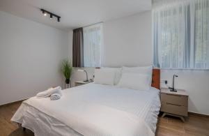 Posteľ alebo postele v izbe v ubytovaní 270 Panorama Kvarner