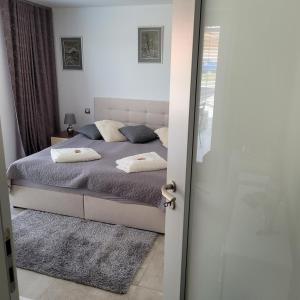 Postel nebo postele na pokoji v ubytování Penzion Sadová 471 u Znojma