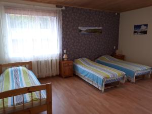 Postel nebo postele na pokoji v ubytování Jõesuu Home Accommodation