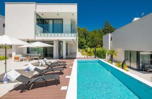 an image of a house with a swimming pool at 270 Panorama Kvarner in Opatija