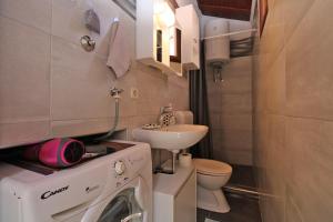 Kúpeľňa v ubytovaní Apartment Luka 2192