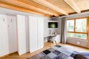 A television and/or entertainment centre at Appartement Murmele