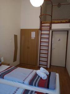 Postel nebo postele na pokoji v ubytování Parton Hotel & Bowling