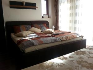 Postel nebo postele na pokoji v ubytování Villa Toscana