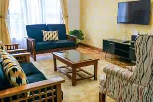 TV a/nebo společenská místnost v ubytování Brickwood Apartments