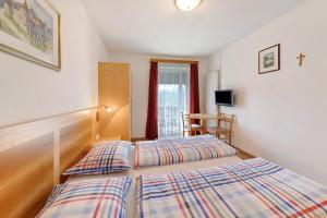 Posteľ alebo postele v izbe v ubytovaní Apartment Panorama