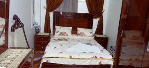 Кровать или кровати в номере KEKA House