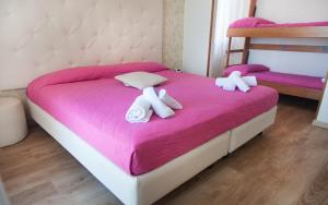 Postel nebo postele na pokoji v ubytování Riviera Mare Beach Life Hotel