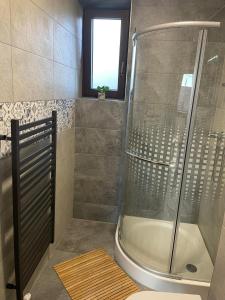 Koupelna v ubytování Apartmány Zaky