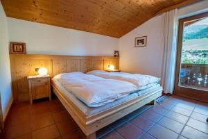 Postel nebo postele na pokoji v ubytování Apartment Mitterdorfer