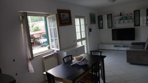A television and/or entertainment centre at Casa Ariel