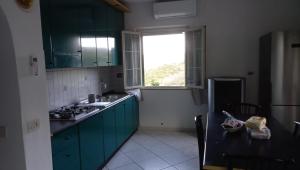 A kitchen or kitchenette at Casa Ariel