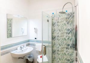 Koupelna v ubytování Hotel Corso