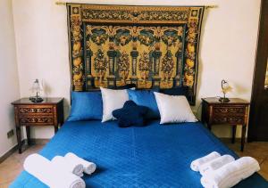 En eller flere senger på et rom på Il Rifugio Imperiale, Villa Adriana, Tivoli