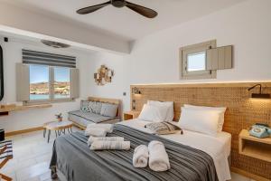 Postel nebo postele na pokoji v ubytování Calma Boutique Hotel