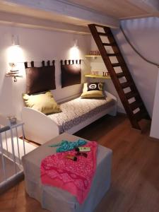 Ένα ή περισσότερα κρεβάτια σε δωμάτιο στο Il Rifugio del Pescatore