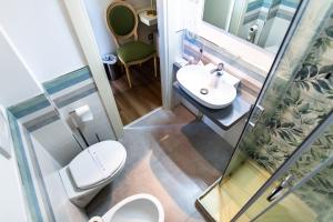 Koupelna v ubytování Hotel Corso