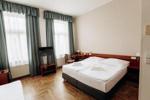 Postel nebo postele na pokoji v ubytování Alton + 36 fotografií