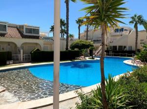 The swimming pool at or close to 3 Bedroom Apartment Playa Flamenca La Zenia