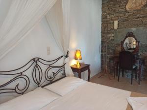 Ένα ή περισσότερα κρεβάτια σε δωμάτιο στο Sifnos View